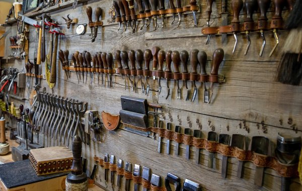 Wall of leather tools image
